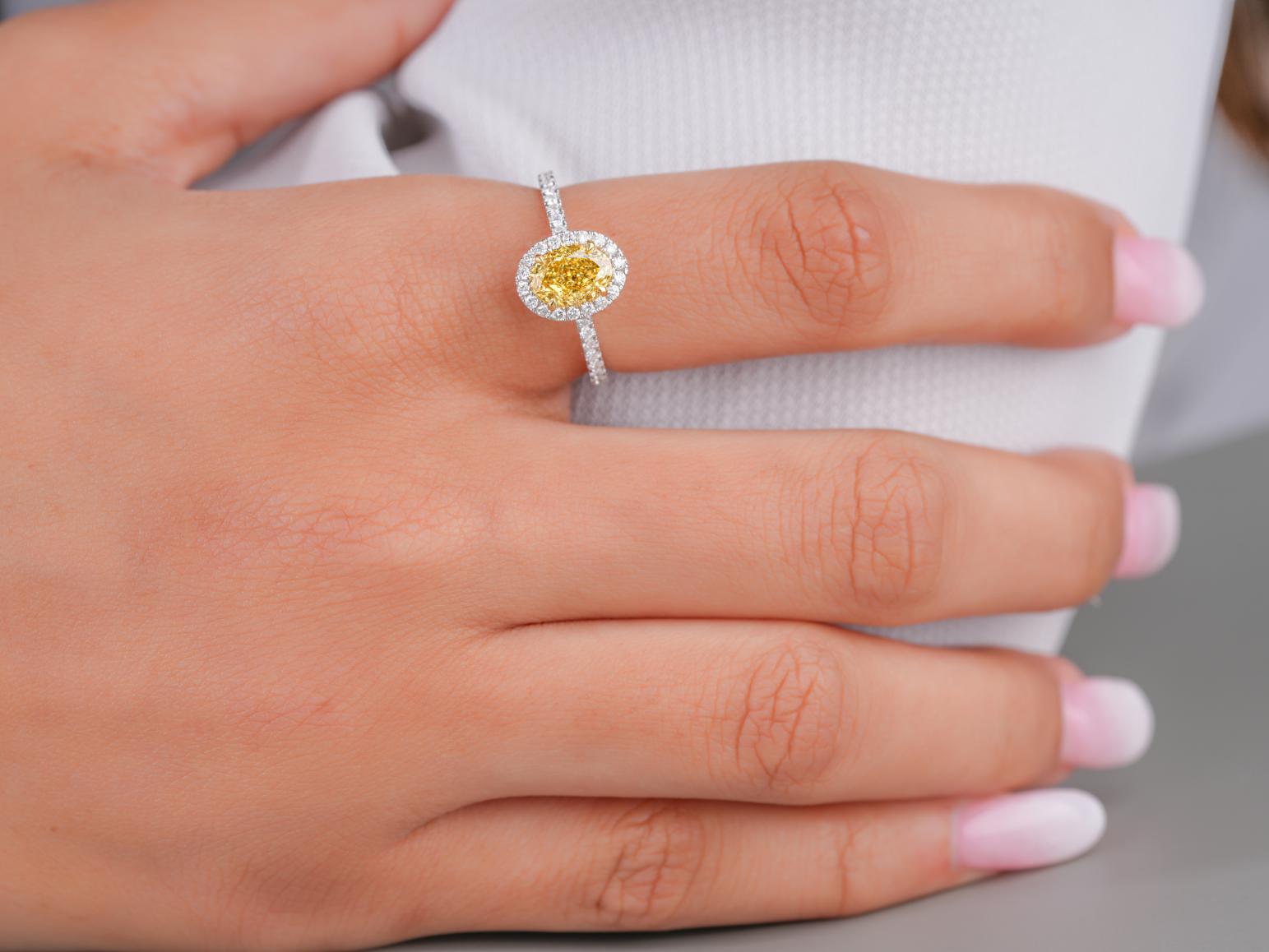 halo engagement ring on claw prong set.
