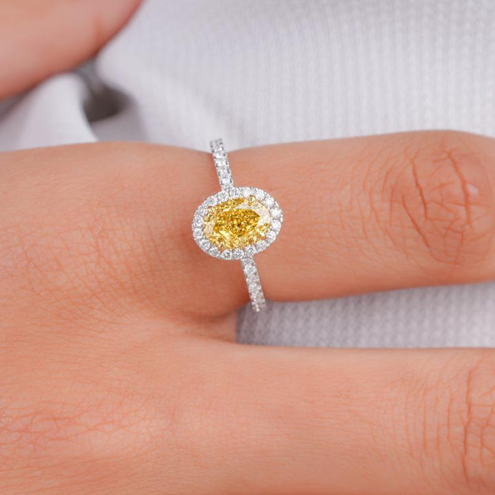 halo engagement ring on claw prong set.
