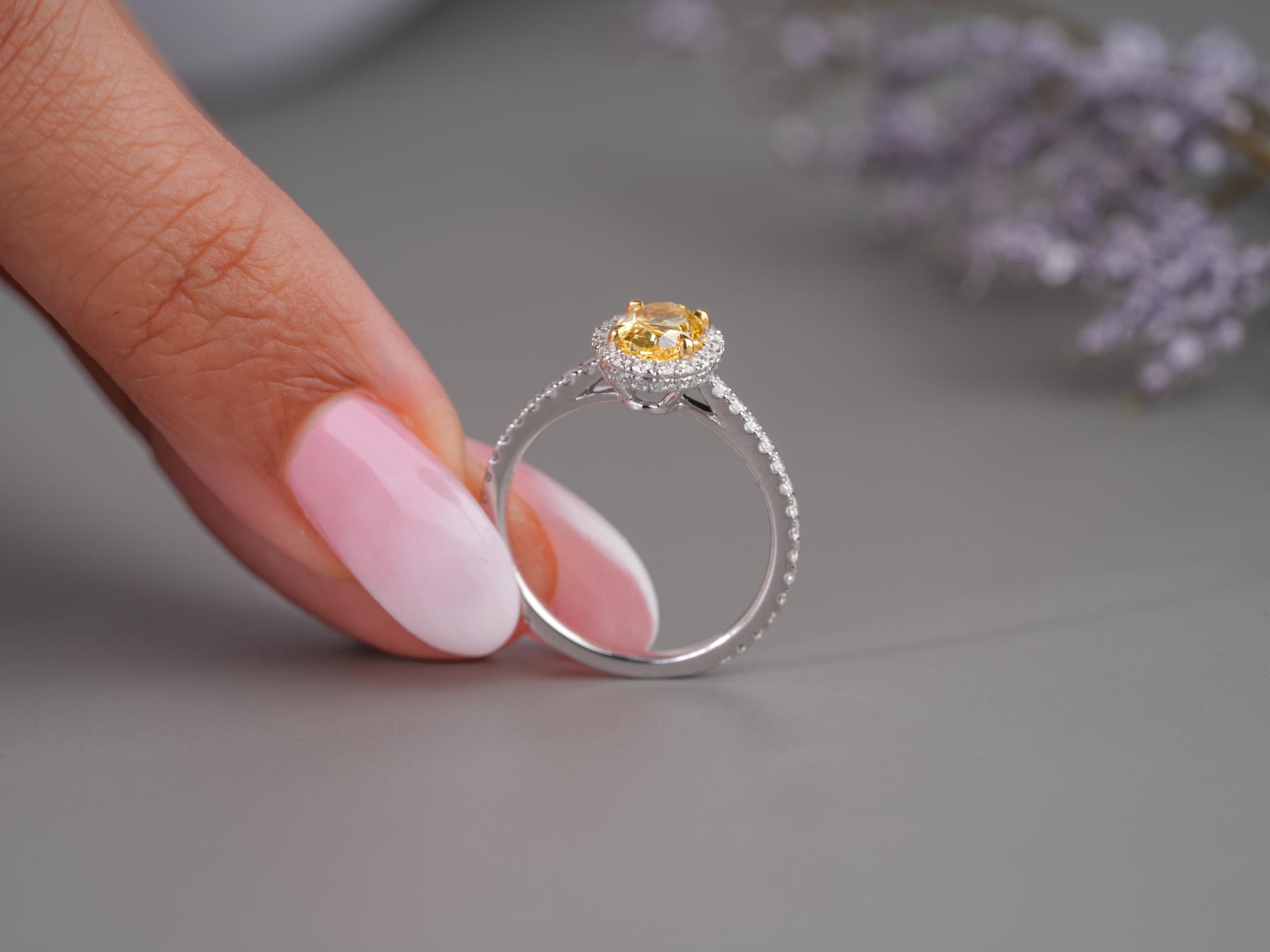 yellow diamond ring in yellow diamond oval cut ring style.

