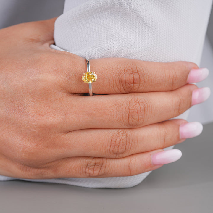 Solitaire Engagement Ring with Fancy yellow color ring.