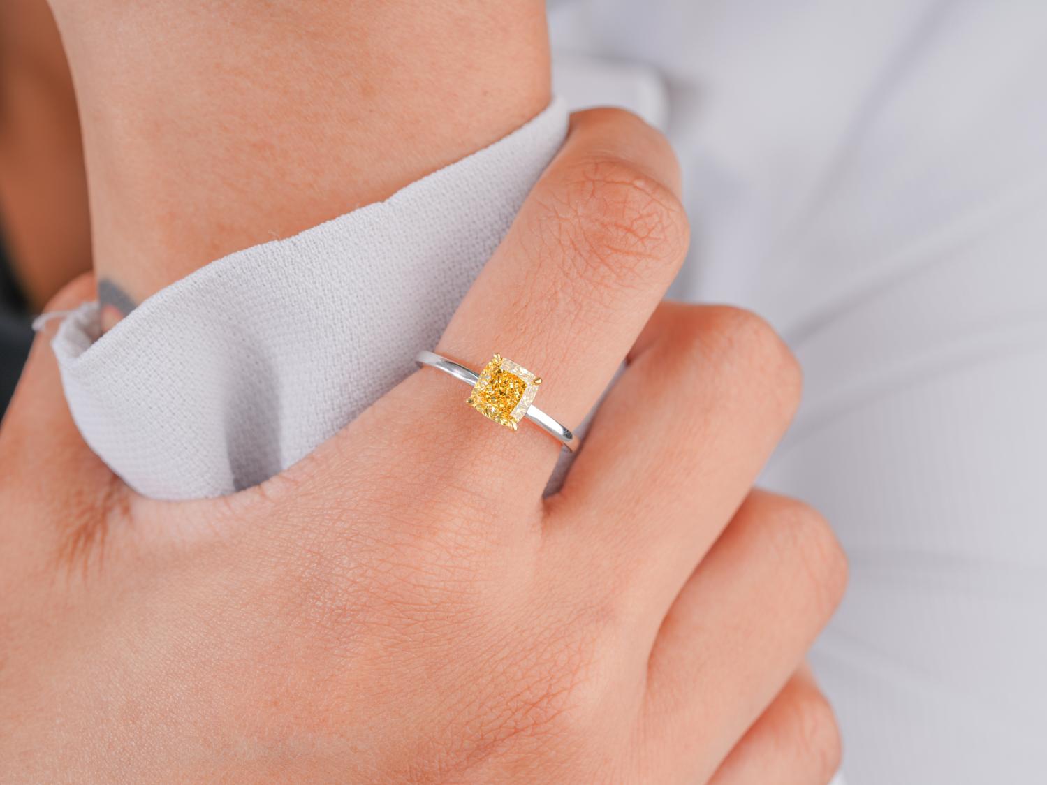 Cushion solitaire ring with 4 claw prong setting.

