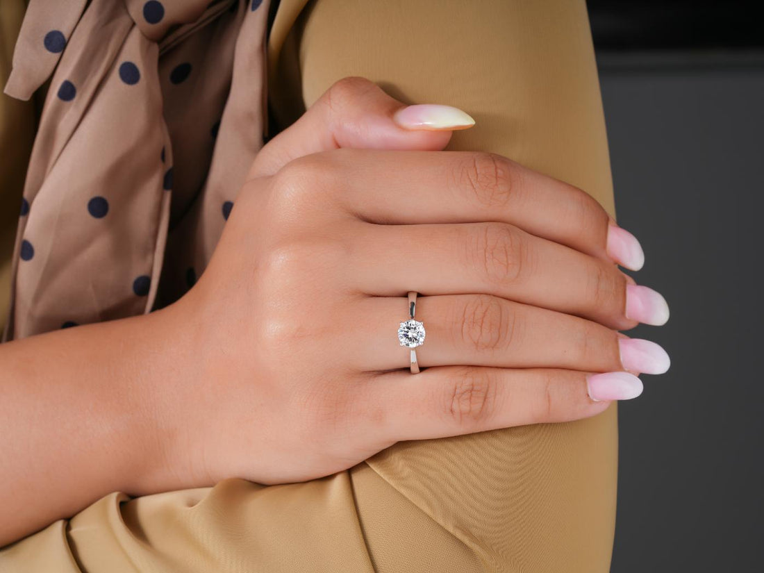 round cut ring with cathedral setting.
