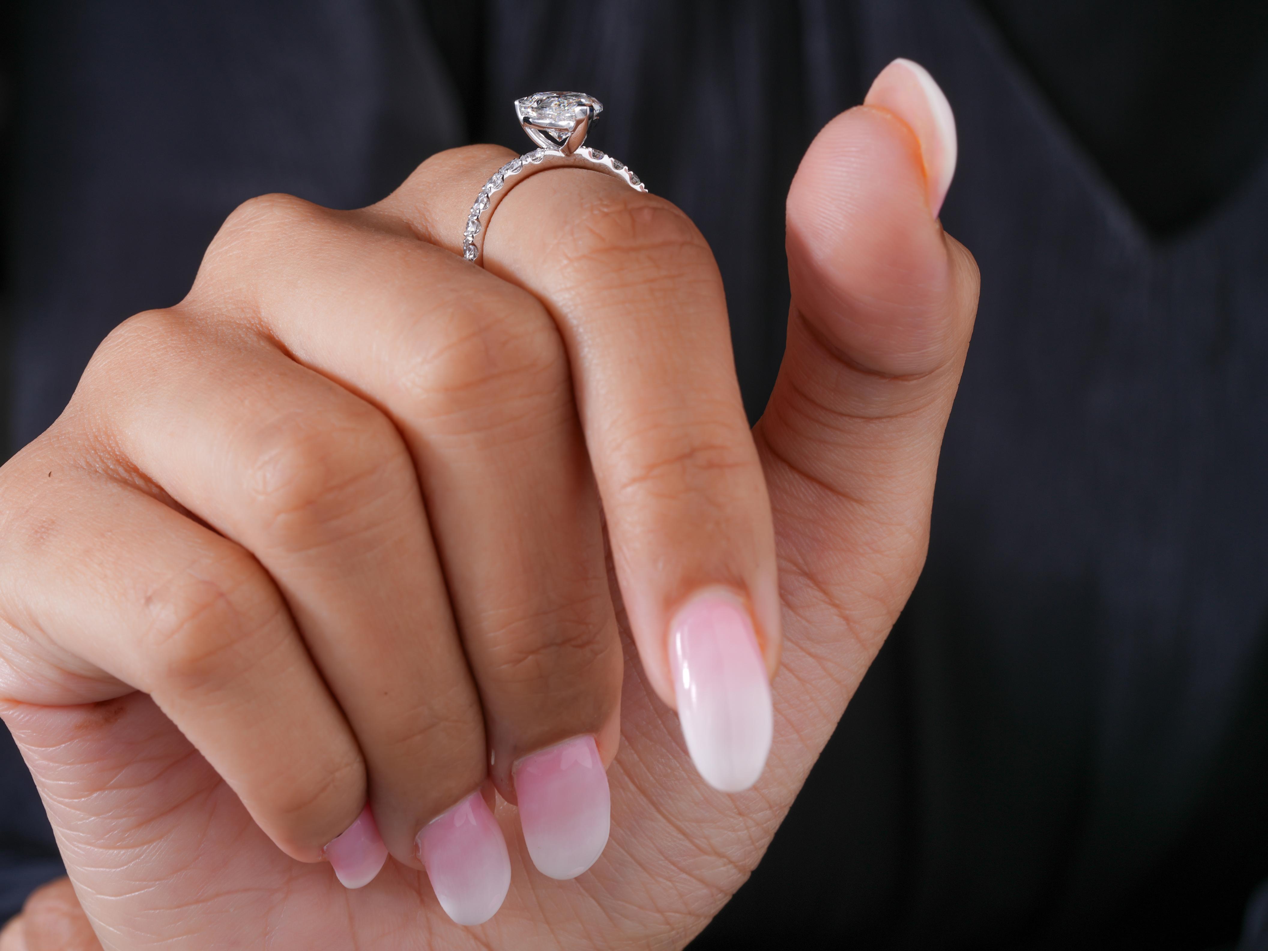 claw prong setting on minimal ring.
