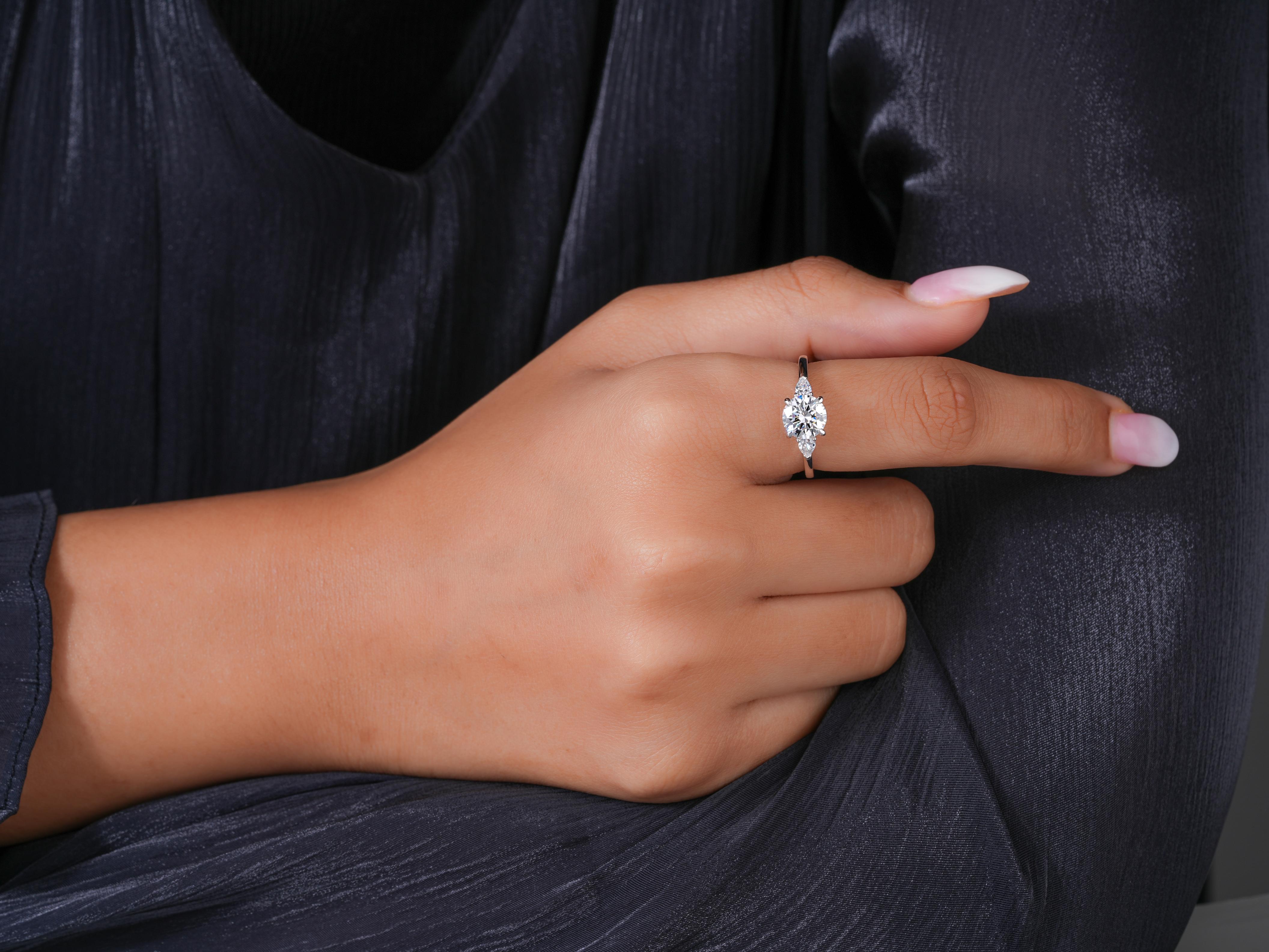past present future ring in Round Diamond engagement ring style.
