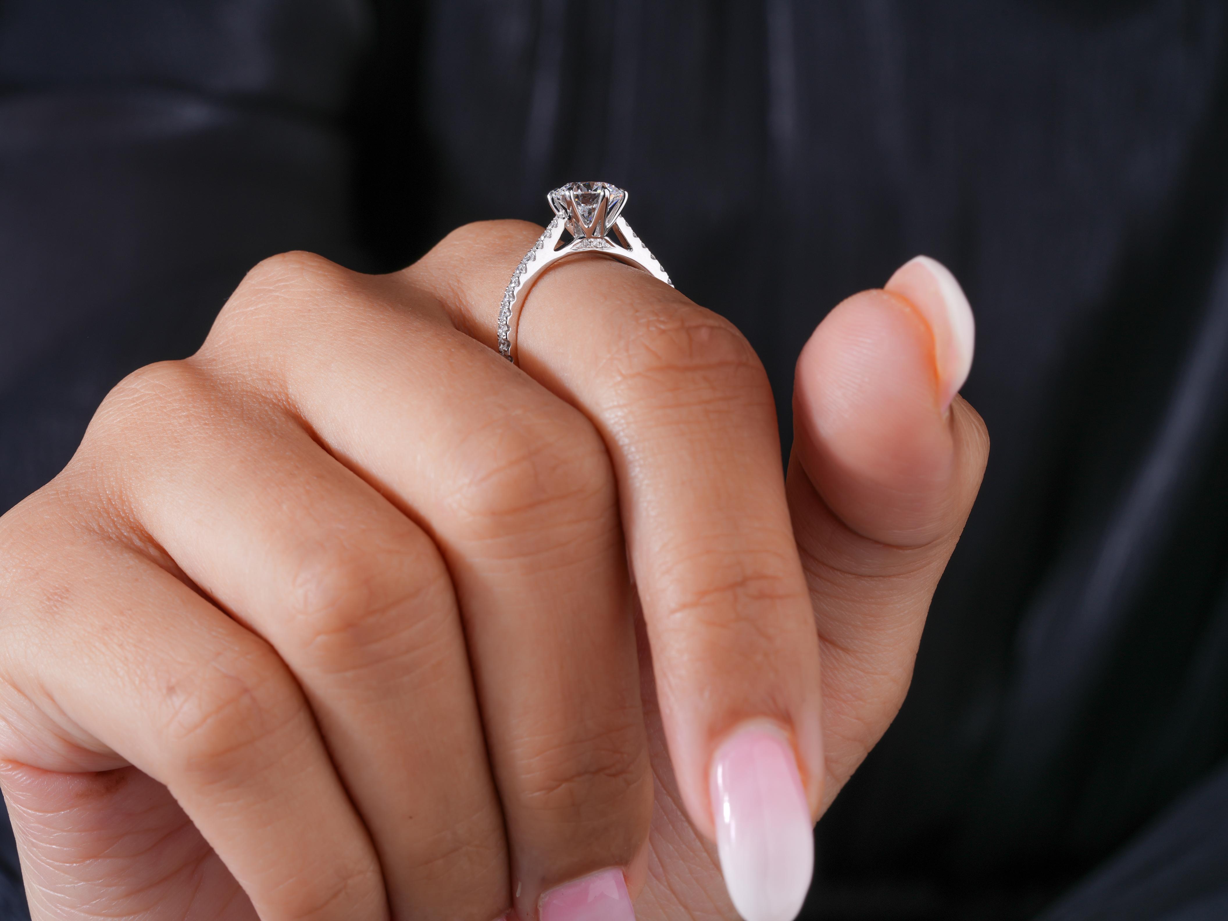 cathedral setting with bridge accent ring.
