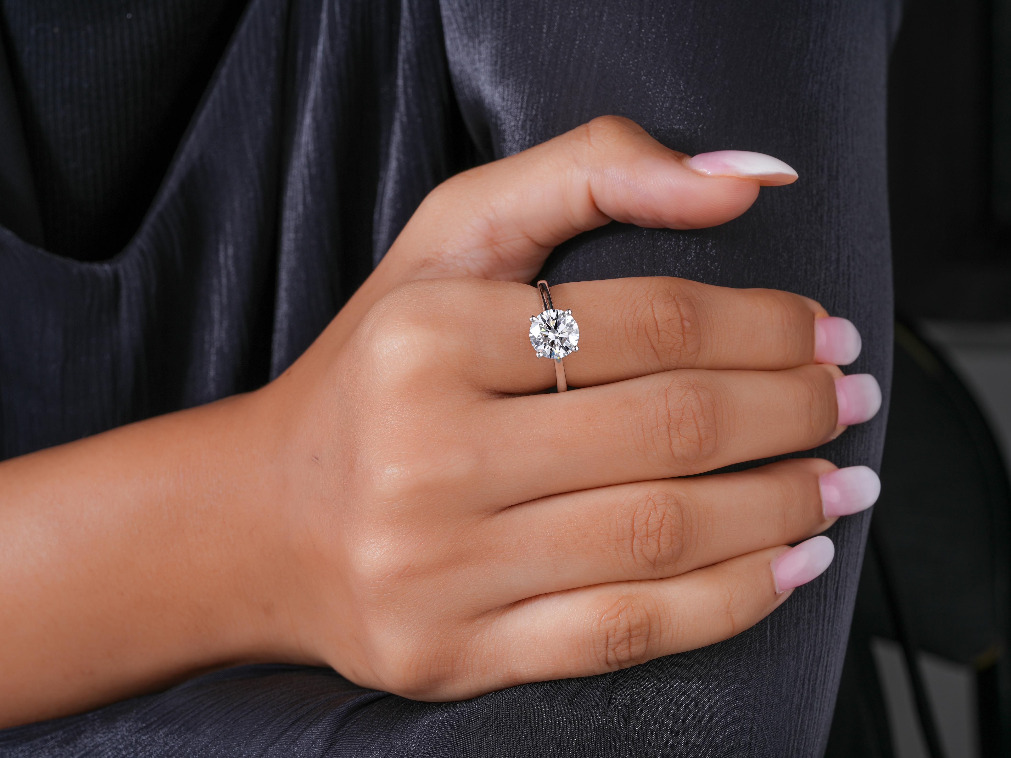 solitaire ring in round diamond engagement ring style.
