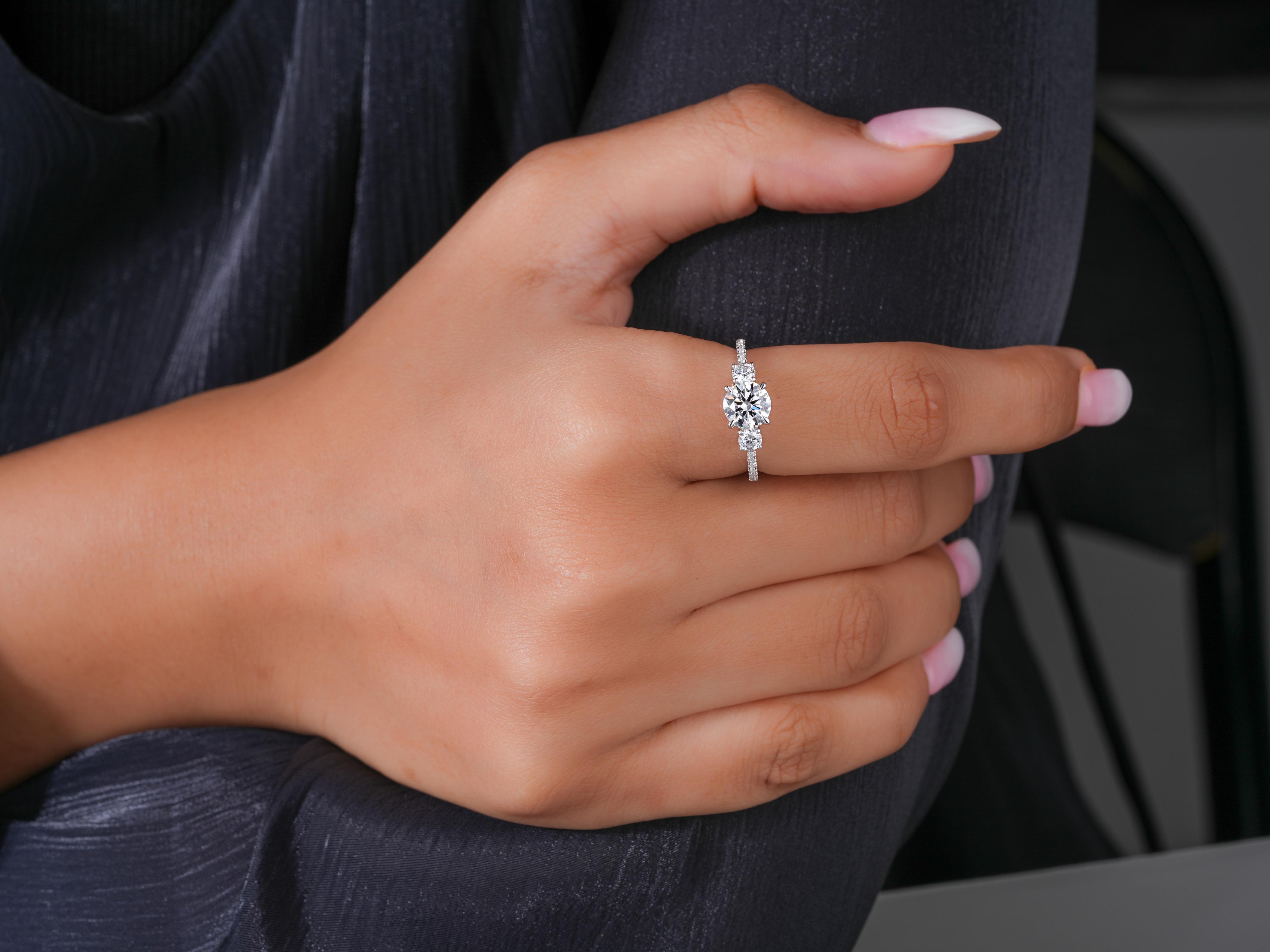 Round Cut Three Stone Diamond Ring