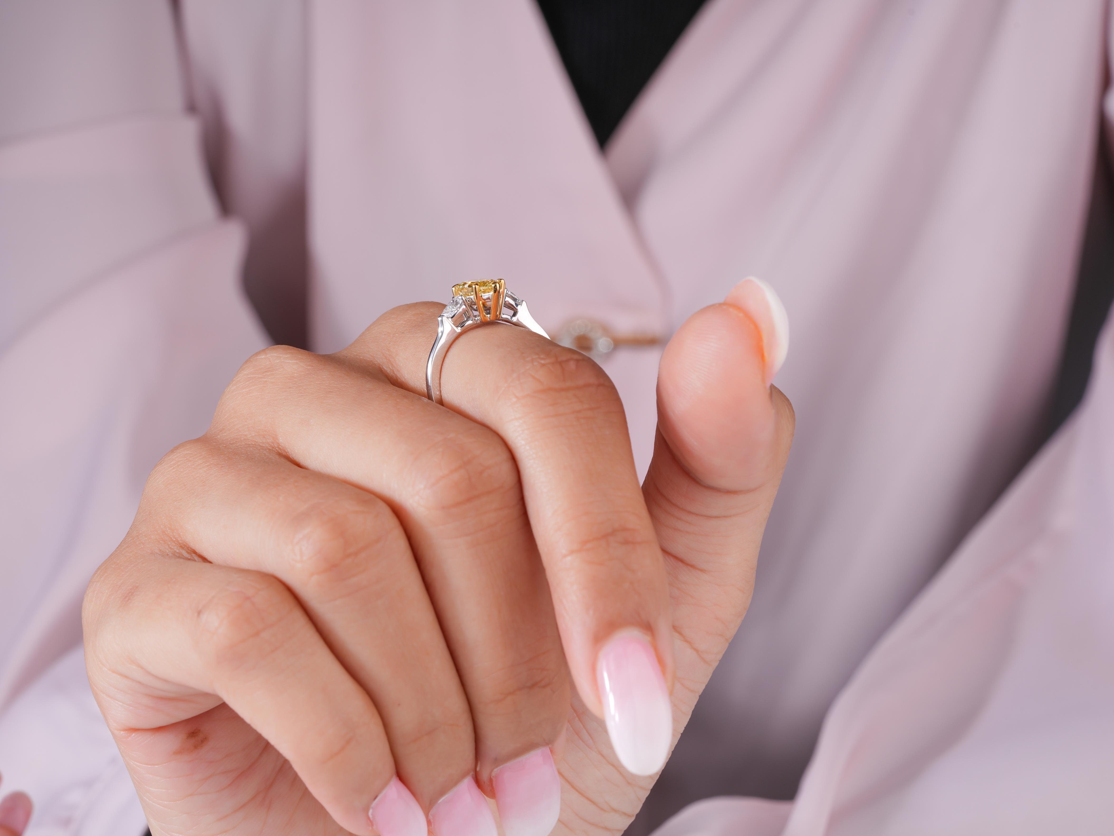 3 stone pear diamond ring with solid gold ring.
