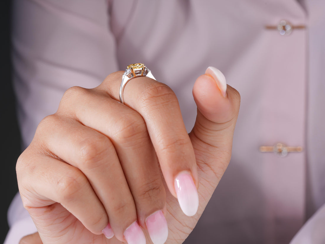 yellow diamond ring in radiant diamond ring style.
