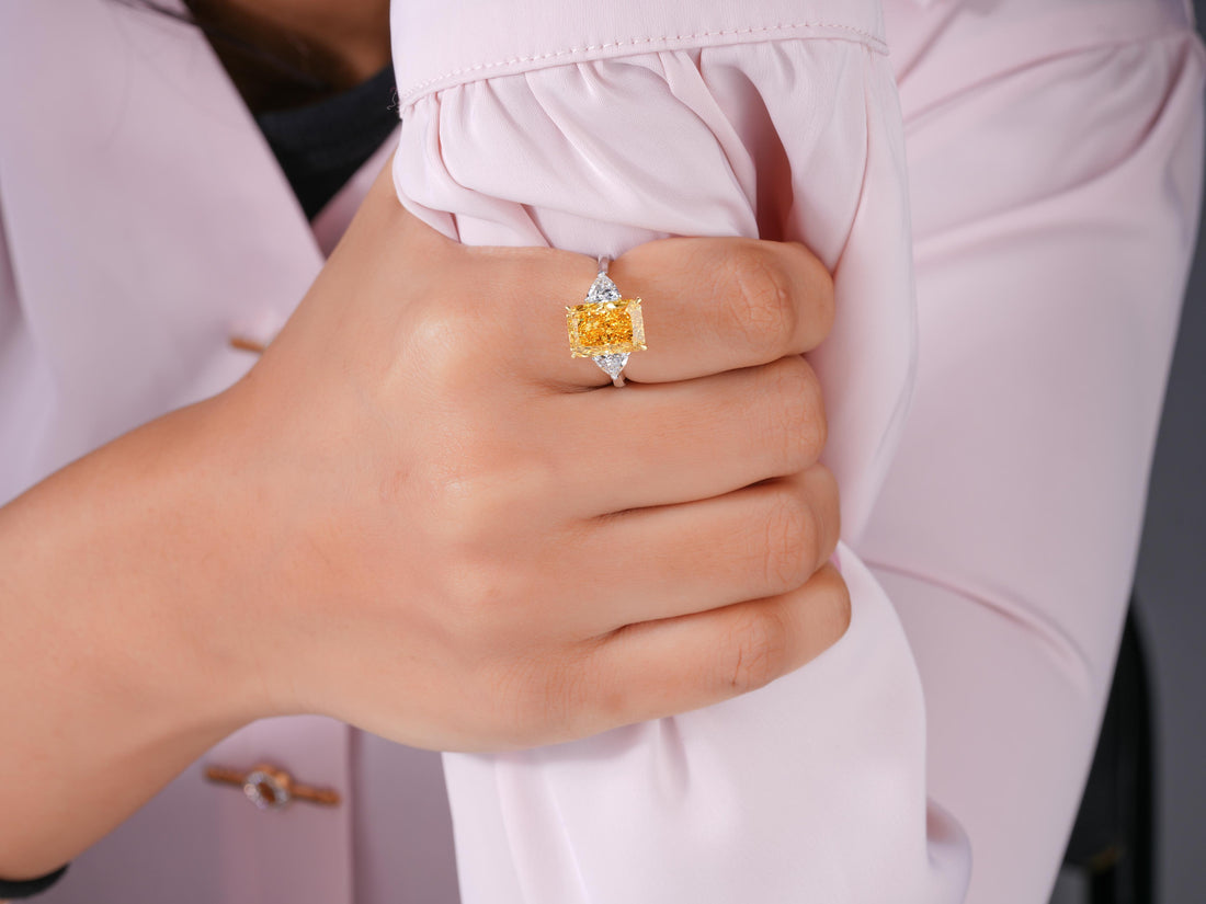 yellow Diamond Ring in yellow diamond three stone ring style.
