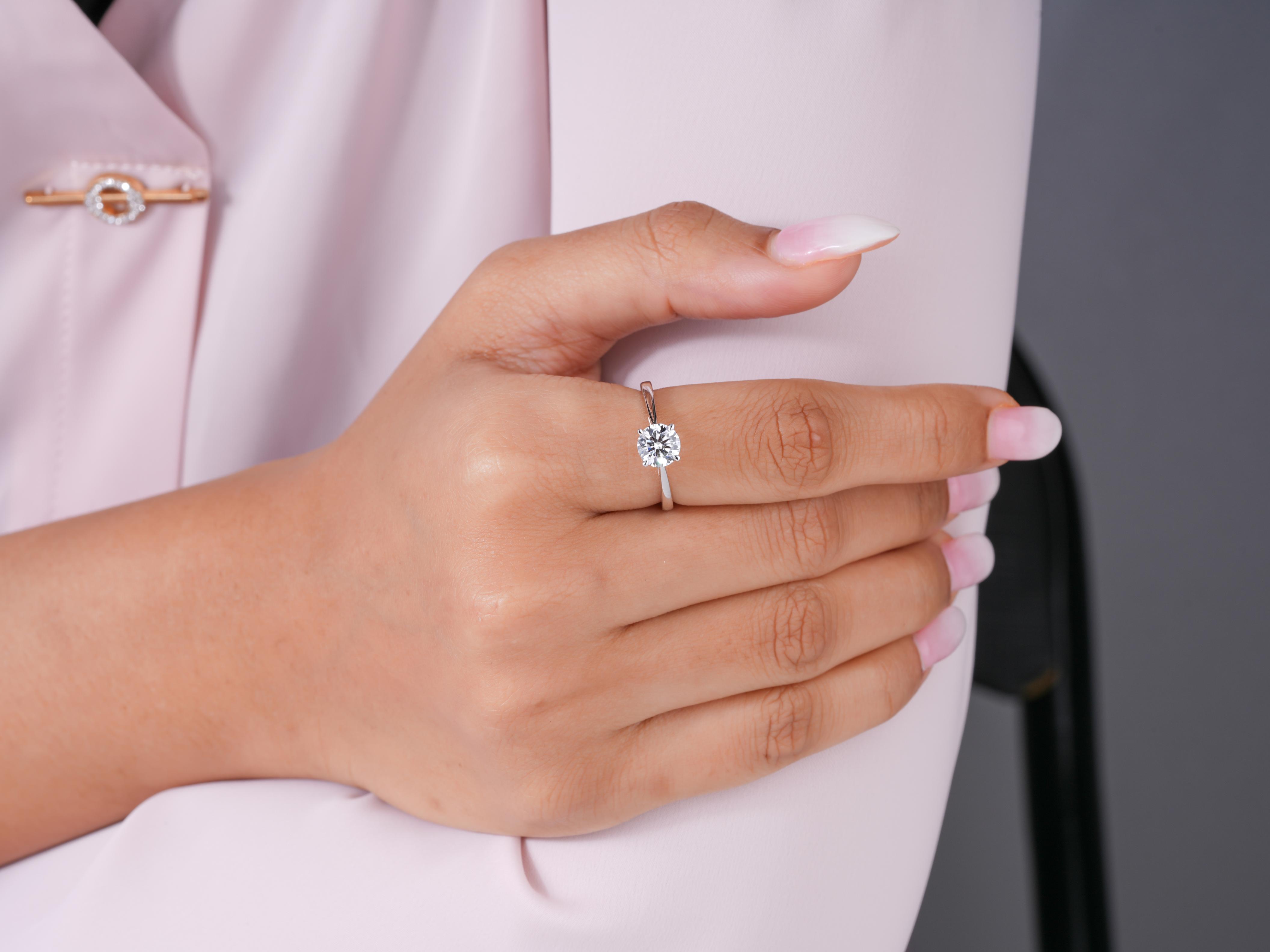 solitaire engagement ring in 4 claw prong set style.
