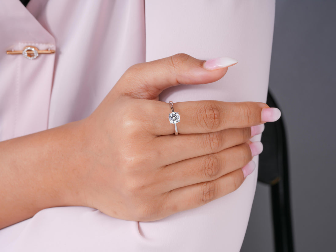 solitaire engagement ring in 4 claw prong set style.
