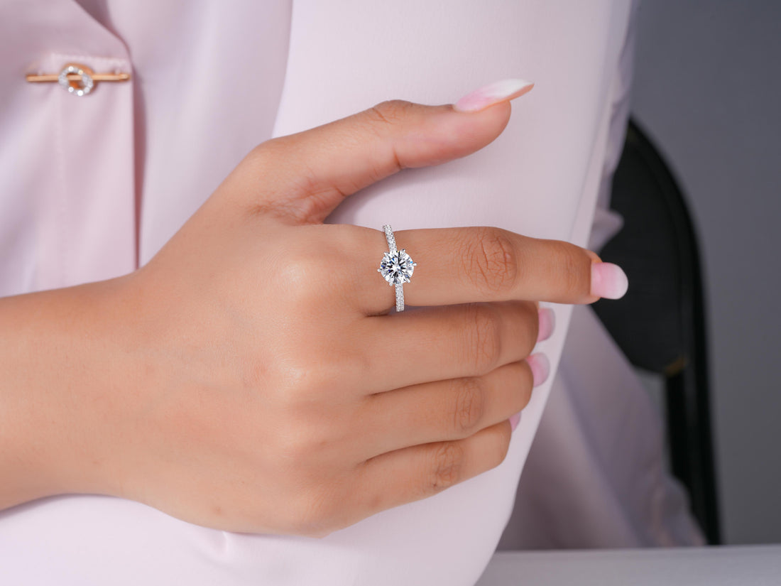 round engagement ring in tulip setting ring style.
