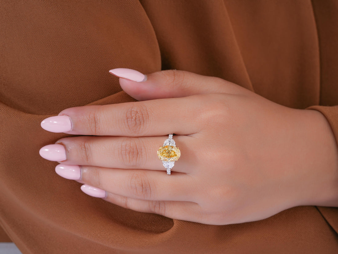 oval cut engagement ring with 4 claw prong setting.
