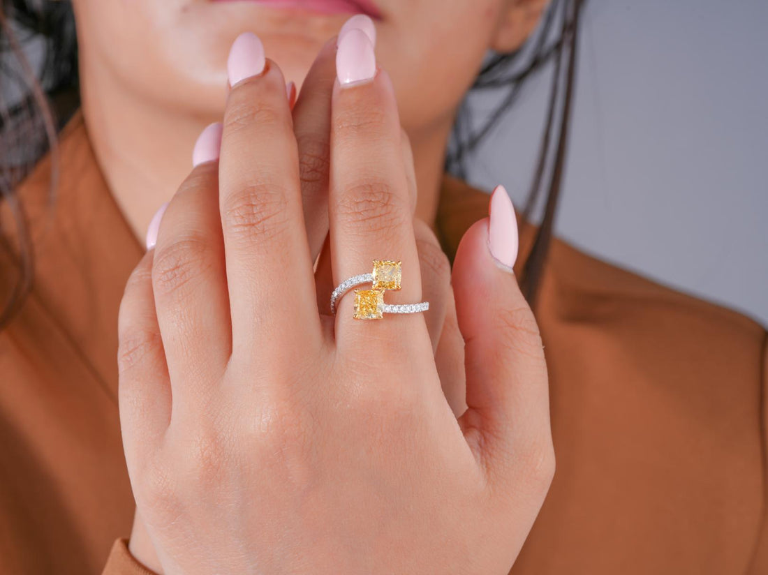 toi et moi diamond ring with claw prong setting.
