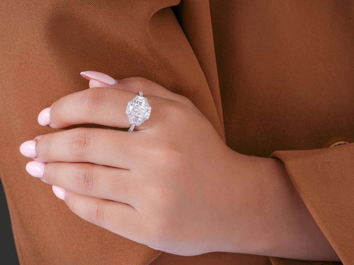 three stone diamond ring in radiant cut engagement ring style.
