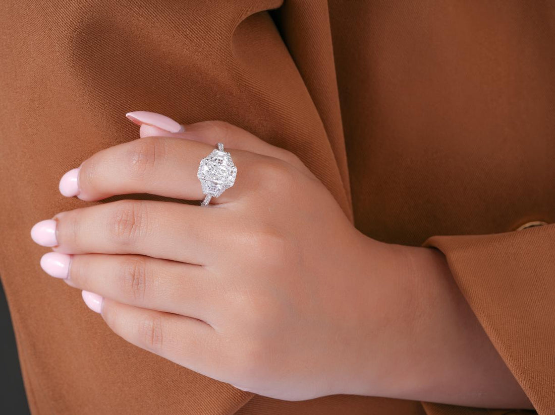 three stone diamond ring in radiant cut engagement ring style.
