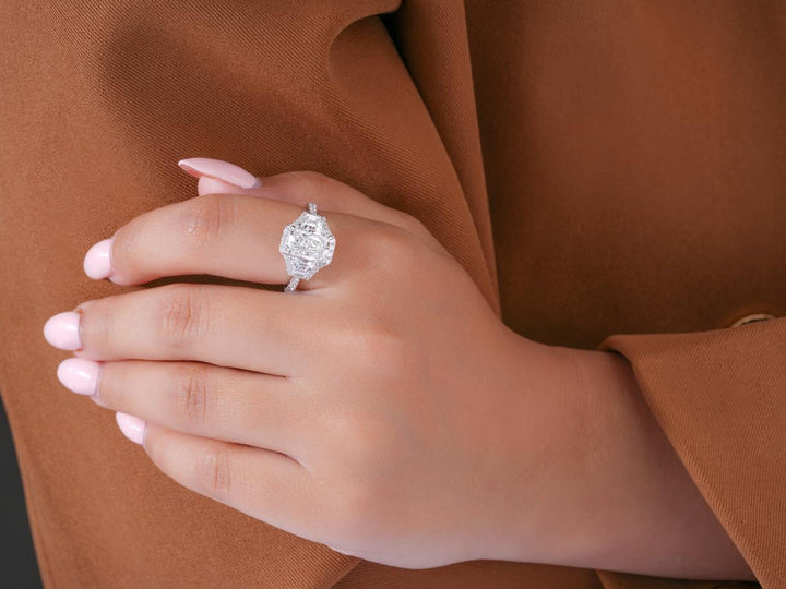 three stone diamond ring in radiant cut engagement ring style.
