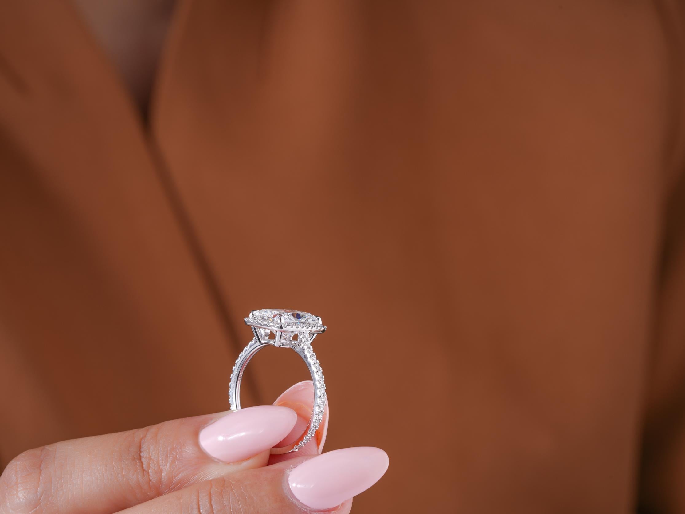 halo diamond ring with cathedral engagement ring.

