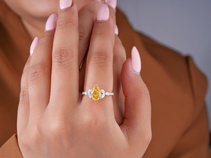 pear engagement ring with pear shaped engagement ring.

