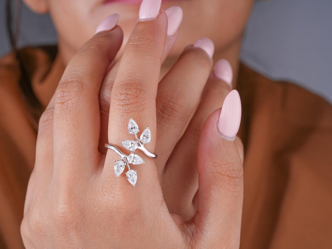 tree branch ring with leaf cuff ring.
