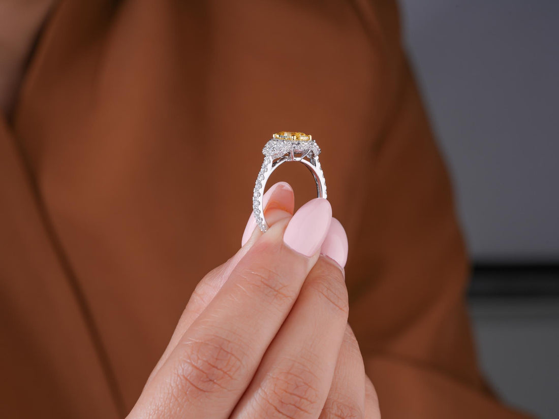 oval halo engagement ring in oval cut diamond ring style.
