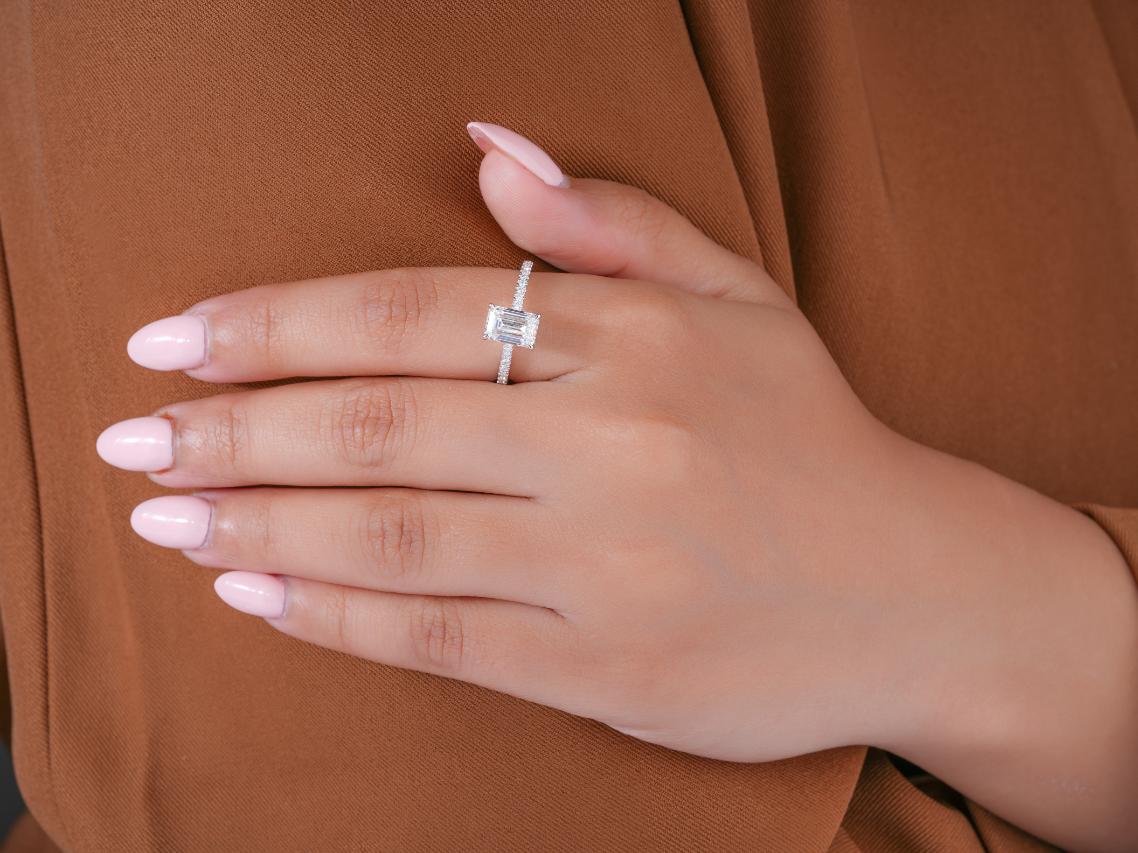 pave set diamond in hidden halo ring style.
