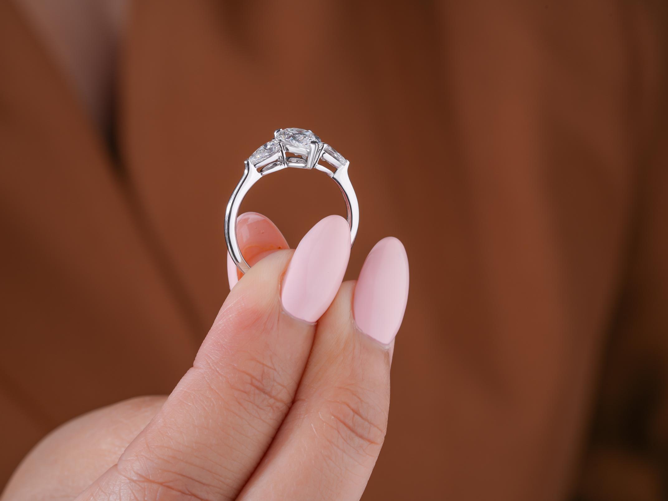 trilogy ring on solid gold ring.
