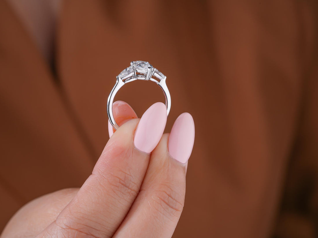 trilogy ring on solid gold ring.
