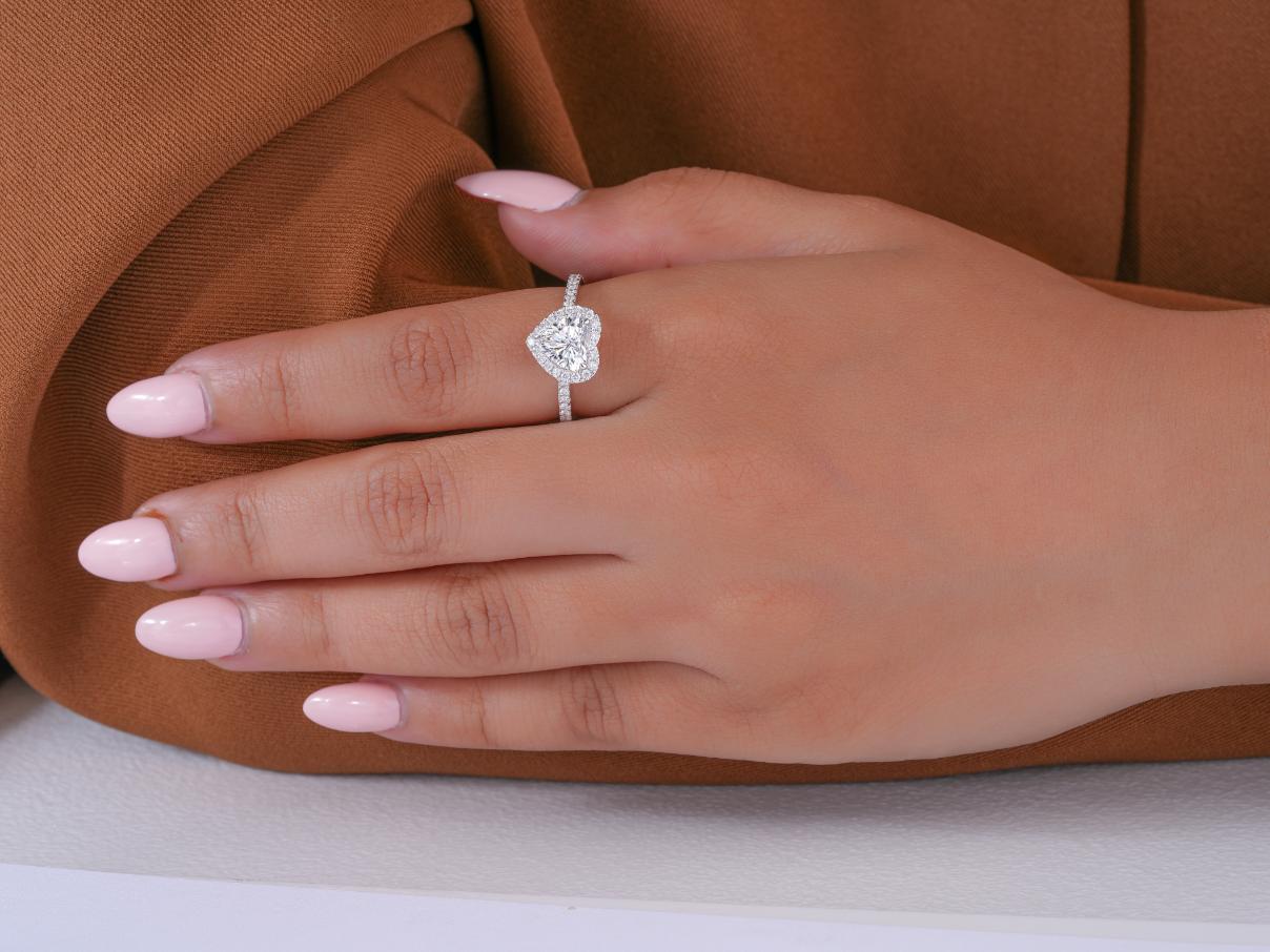 pave engagement ring in cathedral setting ring style.
