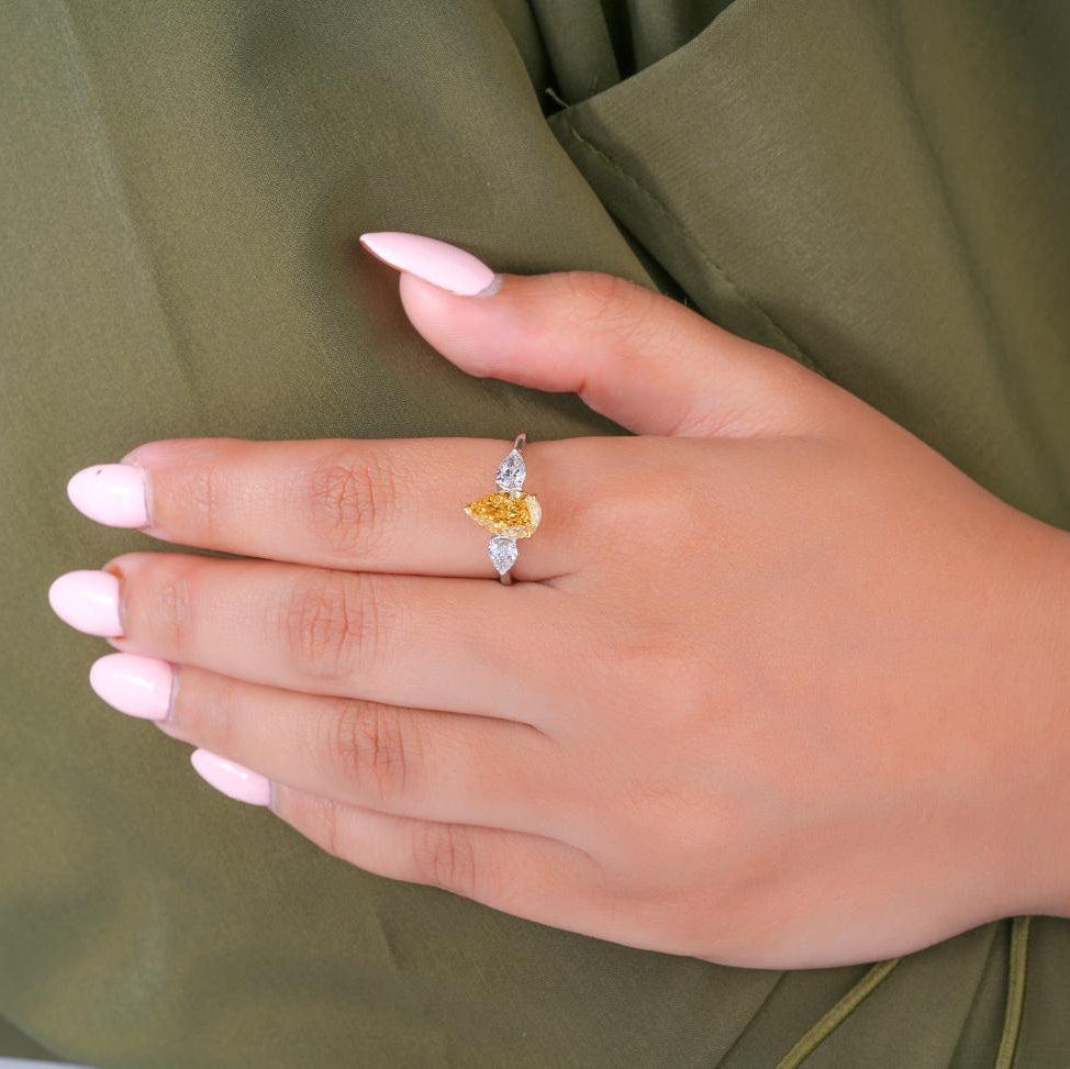 Pear side stones with Past present future ring.
