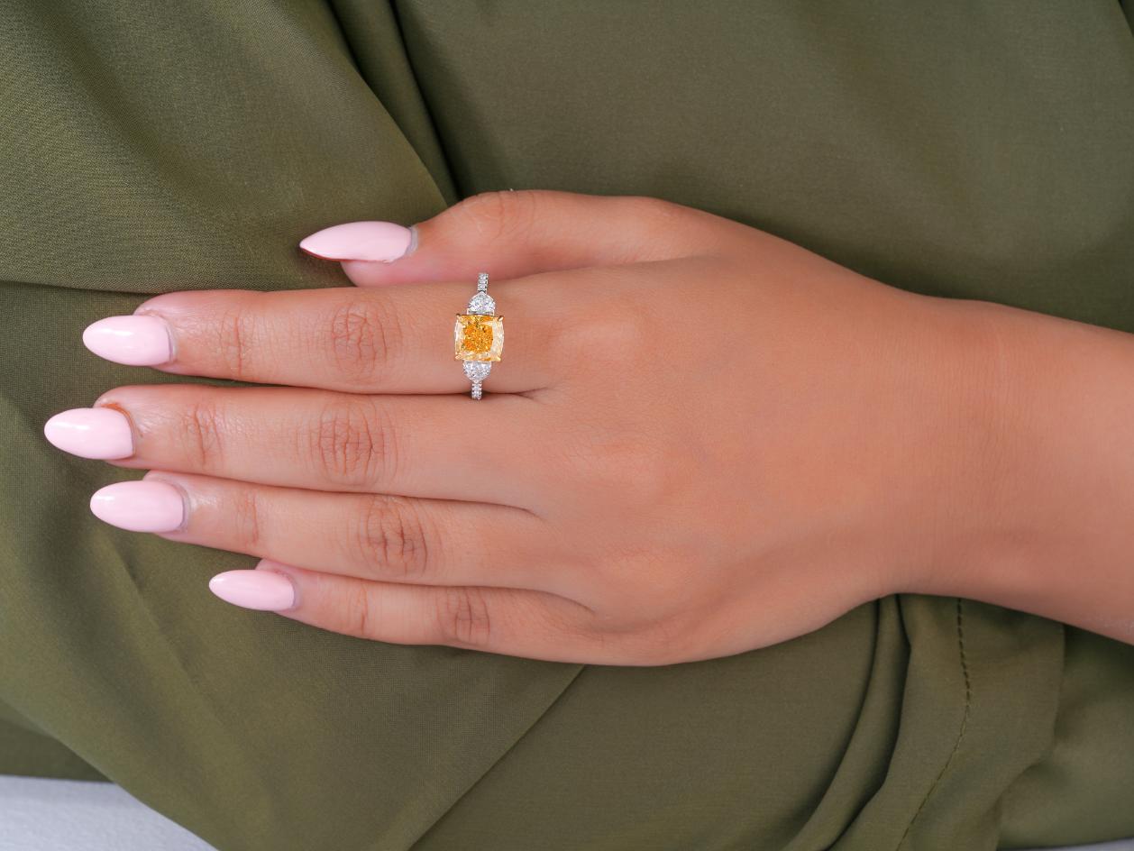 cushion cut ring in yellow cushion diamond ring style.
