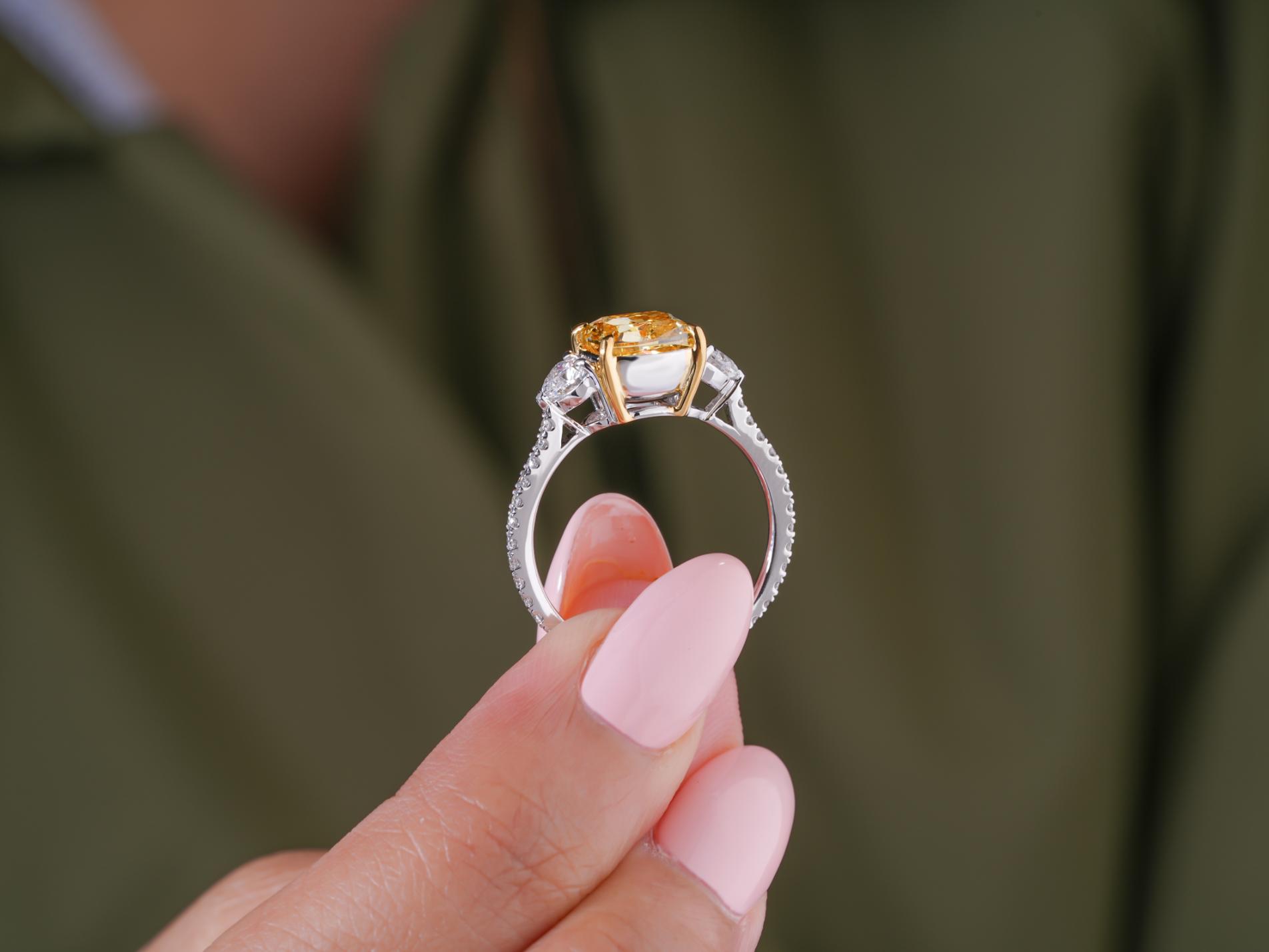trillion side stones on tapered shank ring.

