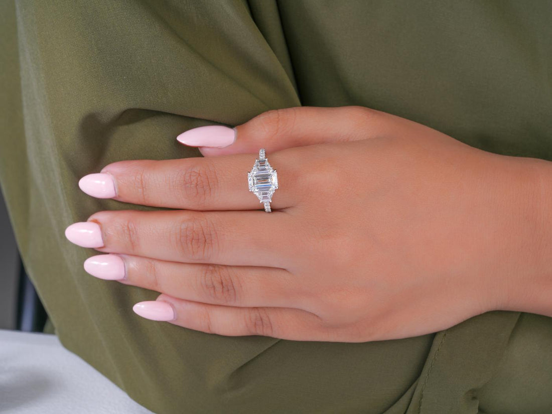 three stone engagement ring in trilogy diamond ring style.
