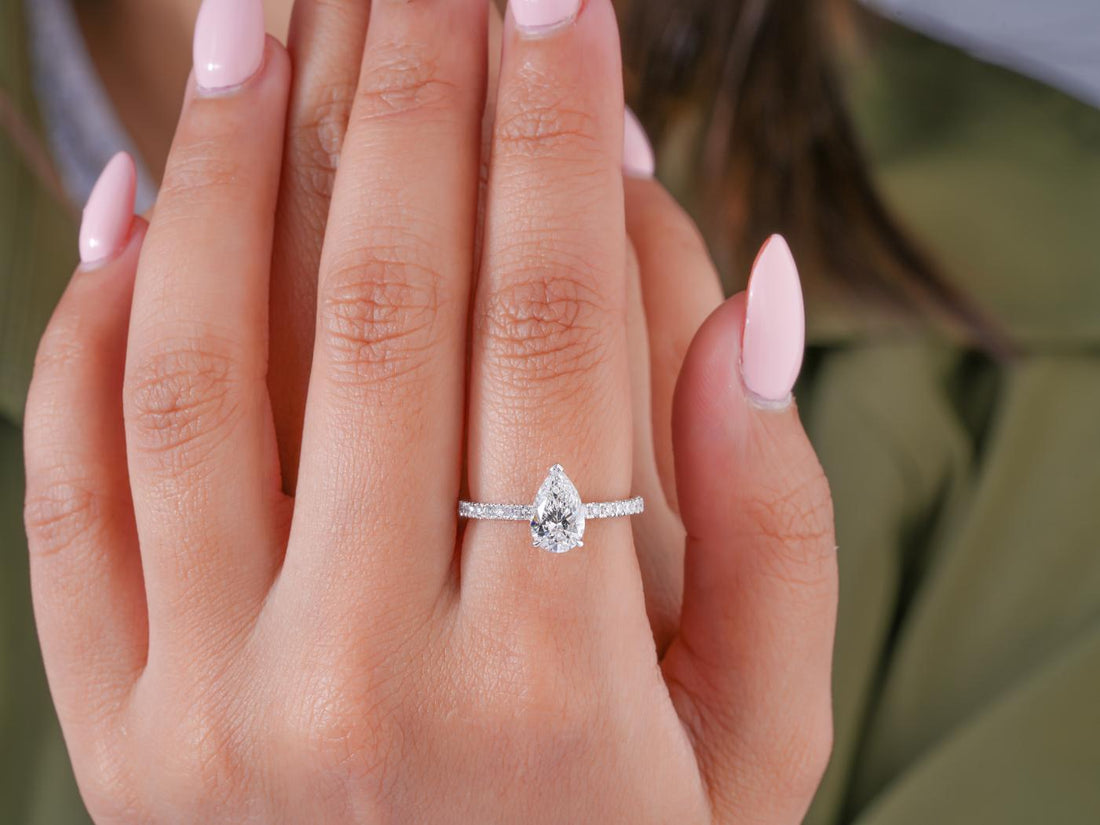 almond shape ring in teardrop engagement ring style.
