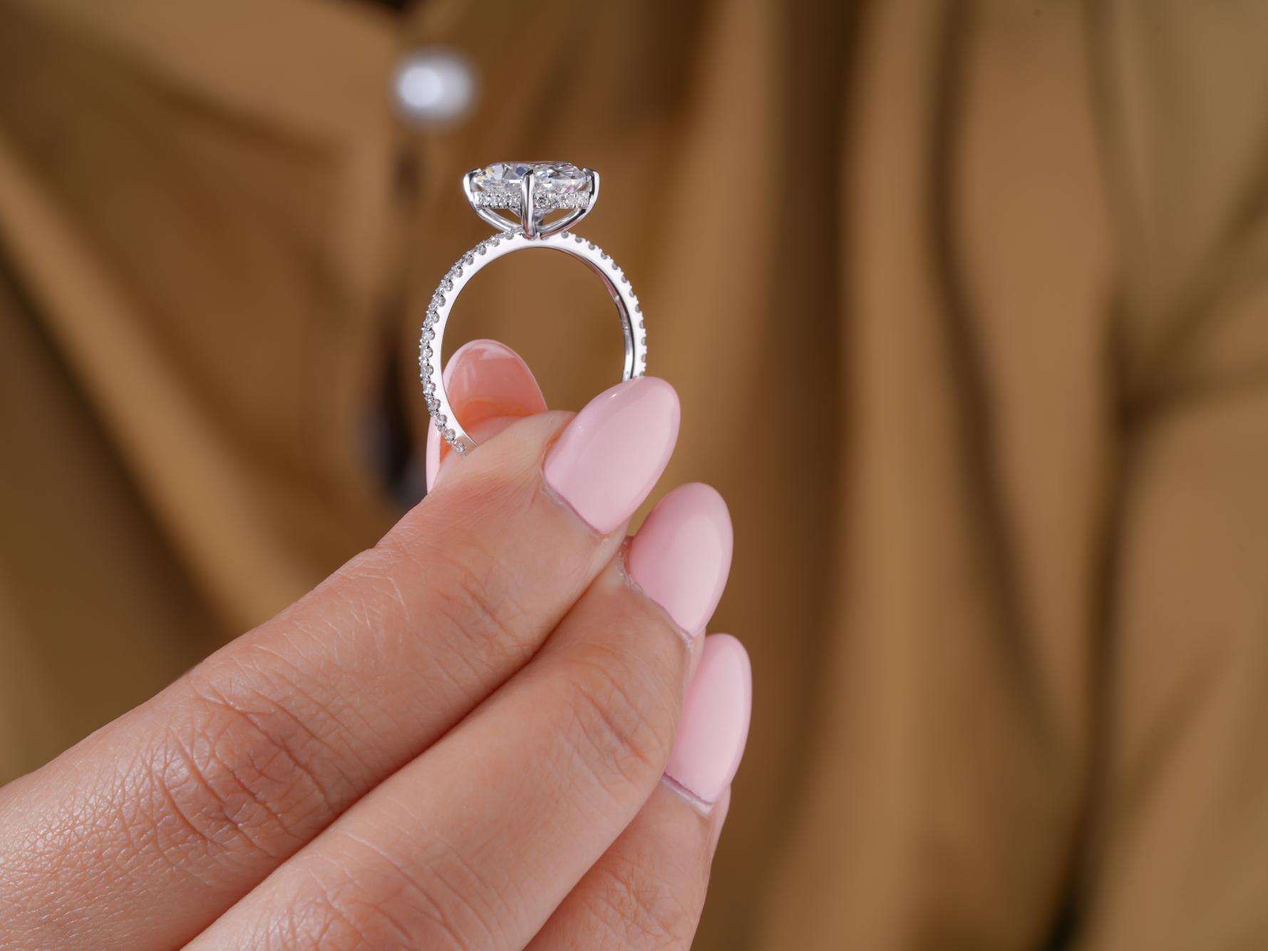 oval diamond ring with solid gold diamond ring.
