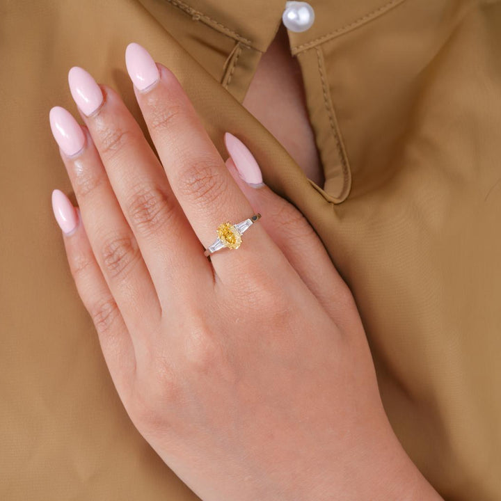Yellow oval diamond ring with Yellow diamond ring.
