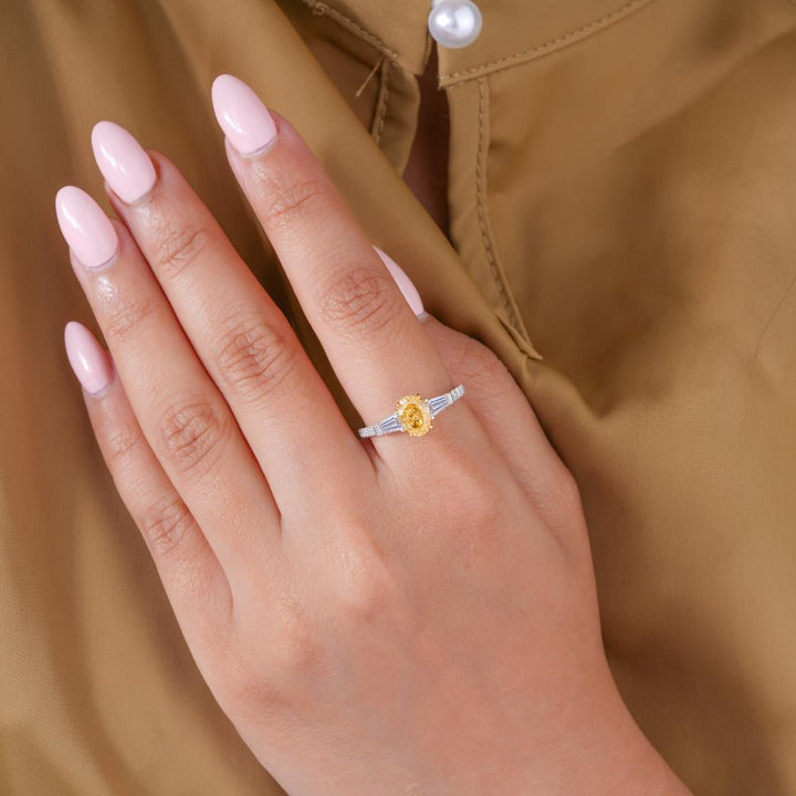 Tapered baguette side stones with Basket setting ring.
