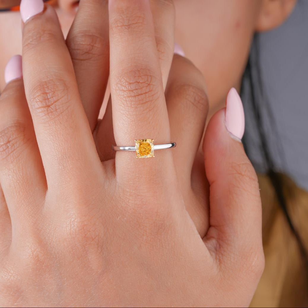 Yellow diamond ring with Two tone gold ring.
