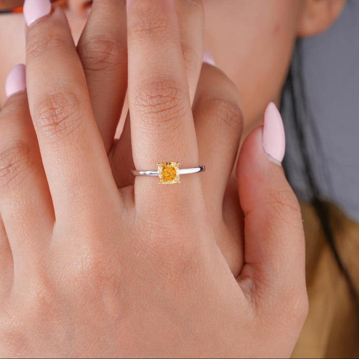 Yellow diamond ring with Two tone gold ring.
