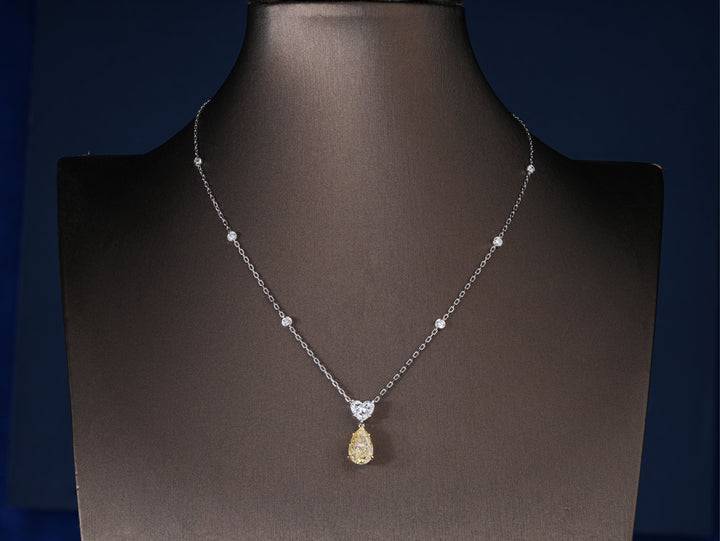 pear diamond pendant with yellow diamond pear drop necklace.