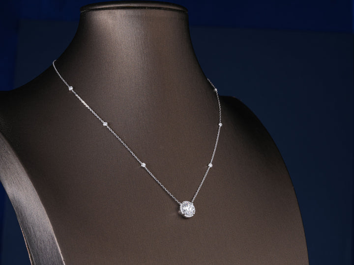 Round Halo Diamond with pendant station chain.
