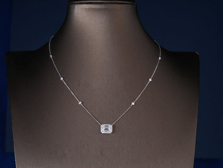 emerald necklace pendant with diamond accent chain.