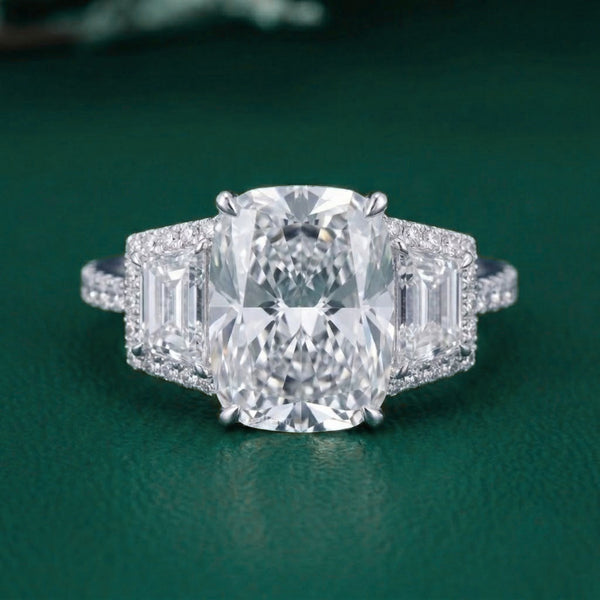 three stone ring with three stone cushion engagement ring.
