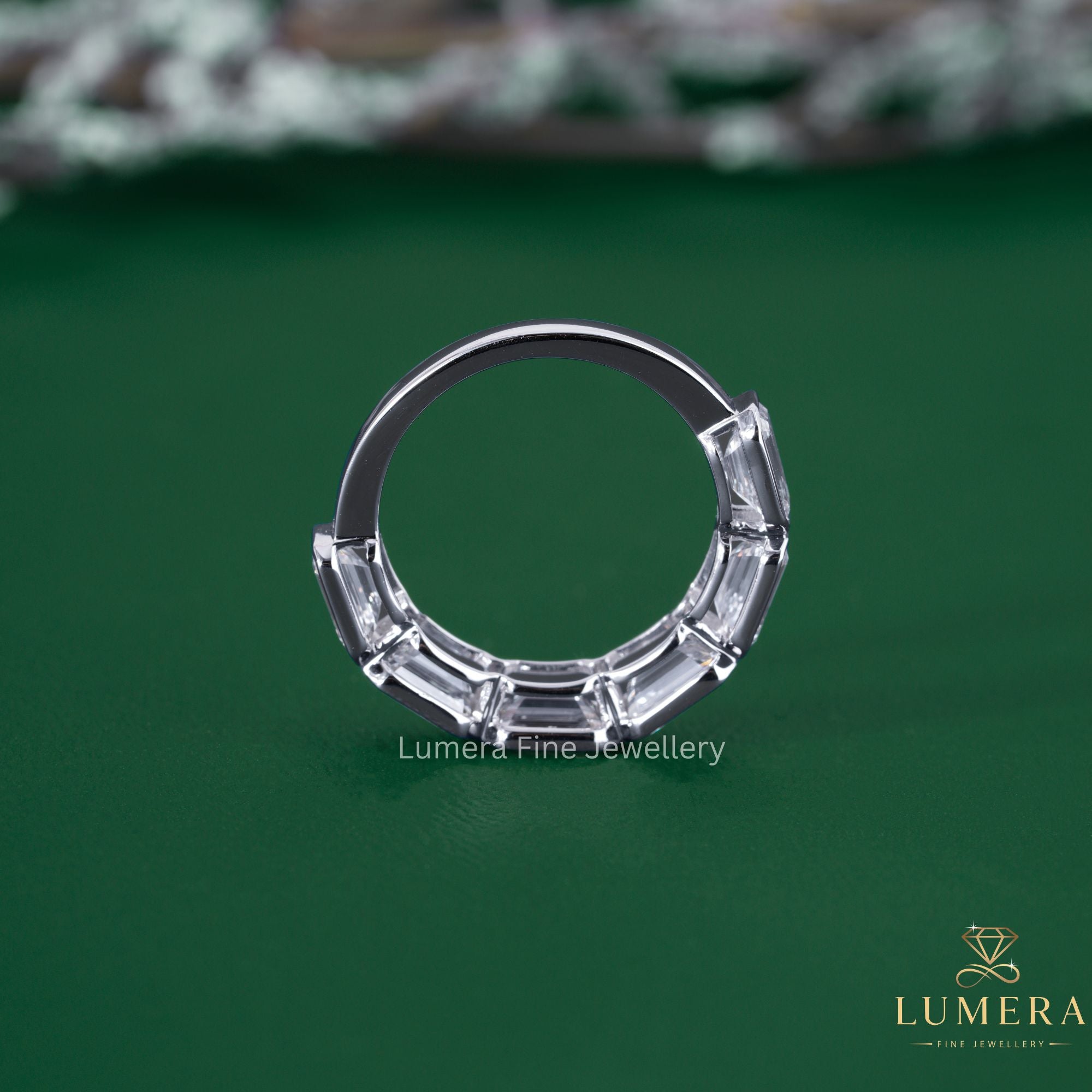 Bezel Set Emerald Cut Half Eternity Band