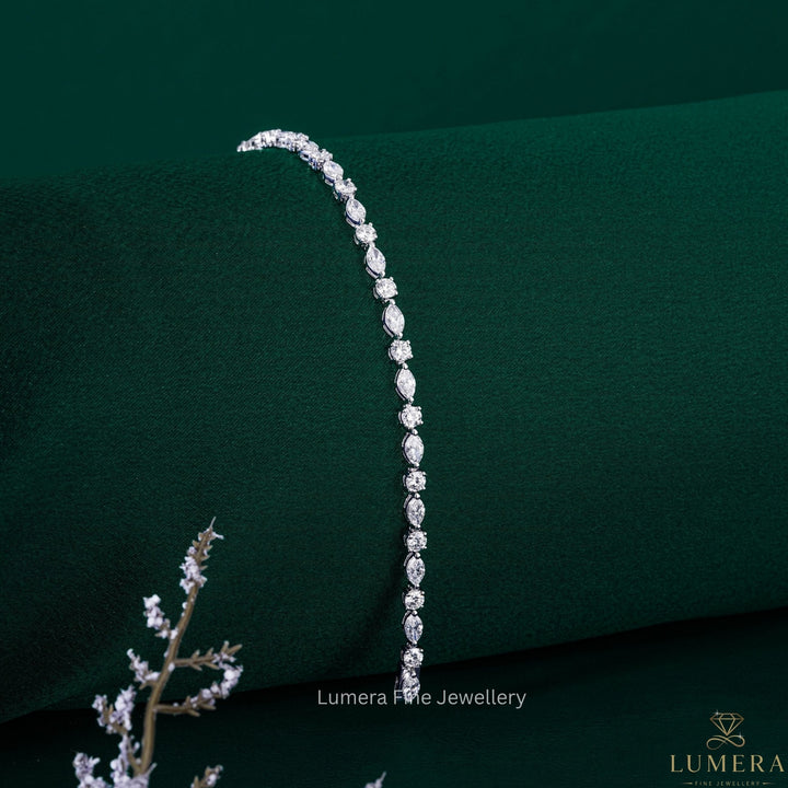 diamond tennis bracelet with alternative marquise and round bracelet.