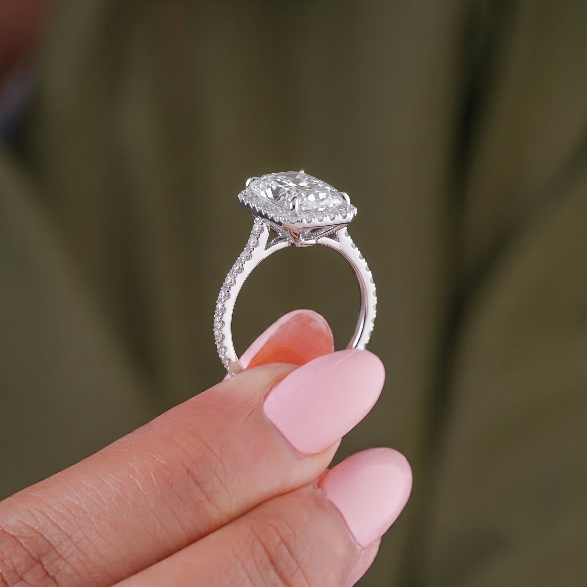 Radiant engagement ring with basket setting ring.
