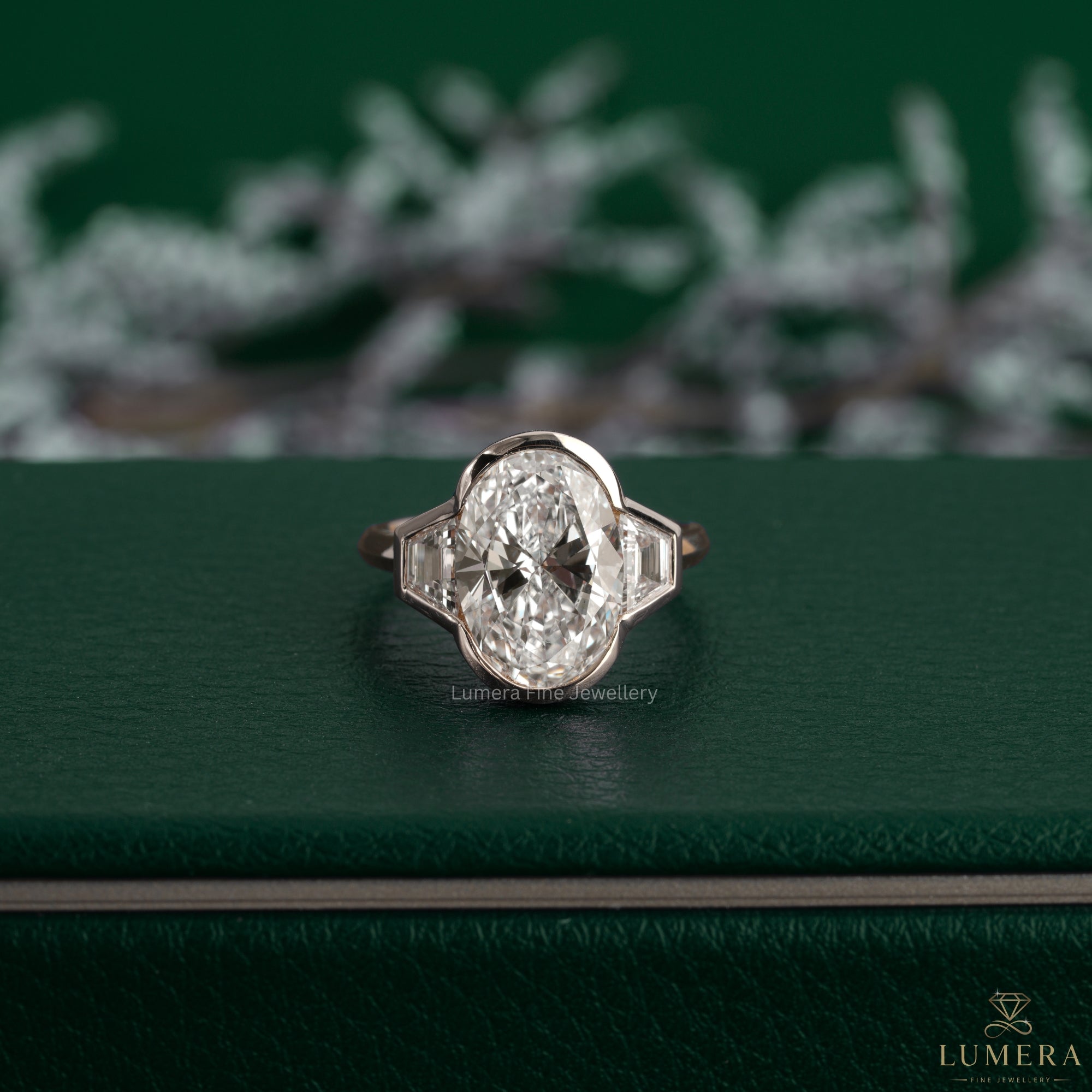Three stone ring featuring an open basket setting.