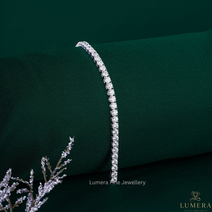 eternity tennis bracelet with round diamond bracelet.