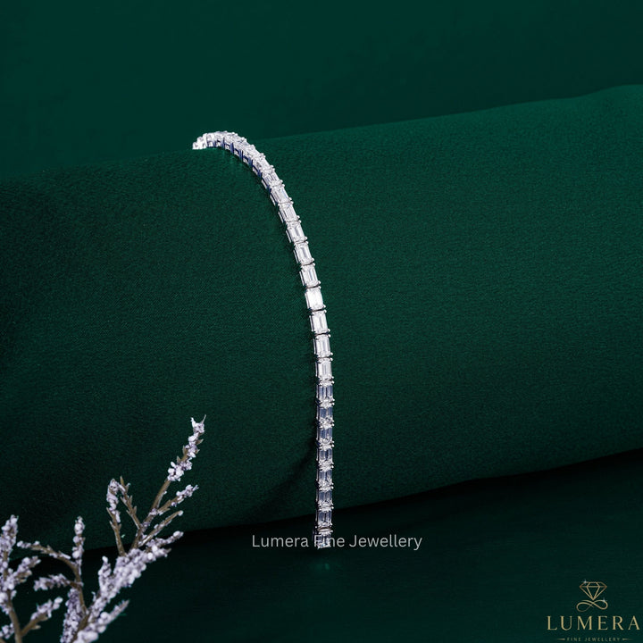 horizontal emerald cut tennis bracelet with emerald shape diamond bracelet.